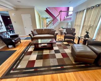RUGS, SOFAS, LEATHER CHAIRS AND OTTOMANS