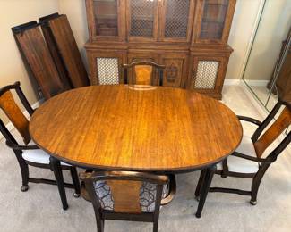 Davis Cherry Dinning Table, 4 chairs on castors, 3 leaves, topper. $900.00 set.  Table: 64”-112”L 44”W 29” T. Chairs: 24”W 19”D 35”T