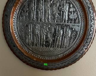 Middle Eastern copper and silver hammered wall plate $75.00.  23” diameter