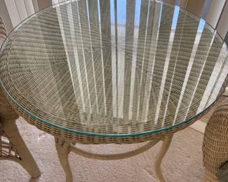 3 piece White Wicker Bistro Set $350.00.  Chairs: 29”W 19” D 34” T holds Table: 30” diameter 28”T glass top