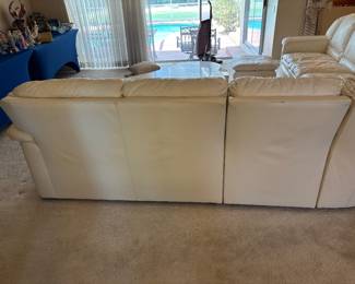 6 piece Cream Leather Sectional Sofa by Leather Craft Inc, Conover, NC. $5,000 set       10.5’ Long each way. 2 end pieces: 55”L 38”D 36” T,  2 single pieces: 23”L 38”D 36”T, 1 corner piece 66” L 38”D 36”T, Footstool 26”L 22”D 15” T