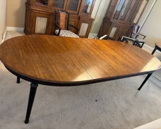 Davis Cherry Dinning Table, 4 chairs on castors, 3 leaves, topper. $900.00 set.  Table: 64”-112”L 44”W 29” T. Chairs: 24”W 19”D 35”T