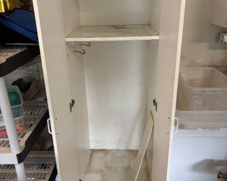 White 2 door storage cabinet $125.00.  24”w 25”d 70”t one shelf