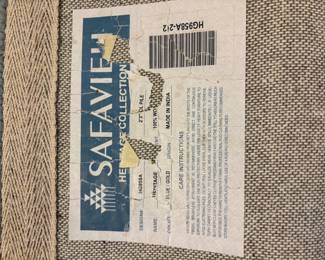 Blue and Tan Safavieh wool rugs. 2.3’w x 12’L runner $75.00, 2.3’w x 19.5’L $150.00,  3.6’ diameter round $40=$40.00