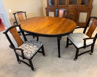 Davis Cherry Dinning Table, 4 chairs on castors, 3 leaves, topper. $900.00 set.  Table: 64”-112”L 44”W 29” T. Chairs: 24”W 19”D 35”T