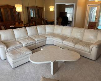 6 piece Cream Leather Sectional Sofa by Leather Craft Inc, Conover, NC. $5,000 set       10.5’ Long each way. 2 end pieces: 55”L 38”D 36” T,  2 single pieces: 23”L 38”D 36”T, 1 corner piece 66” L 38”D 36”T, Footstool 26”L 22”D 15” T