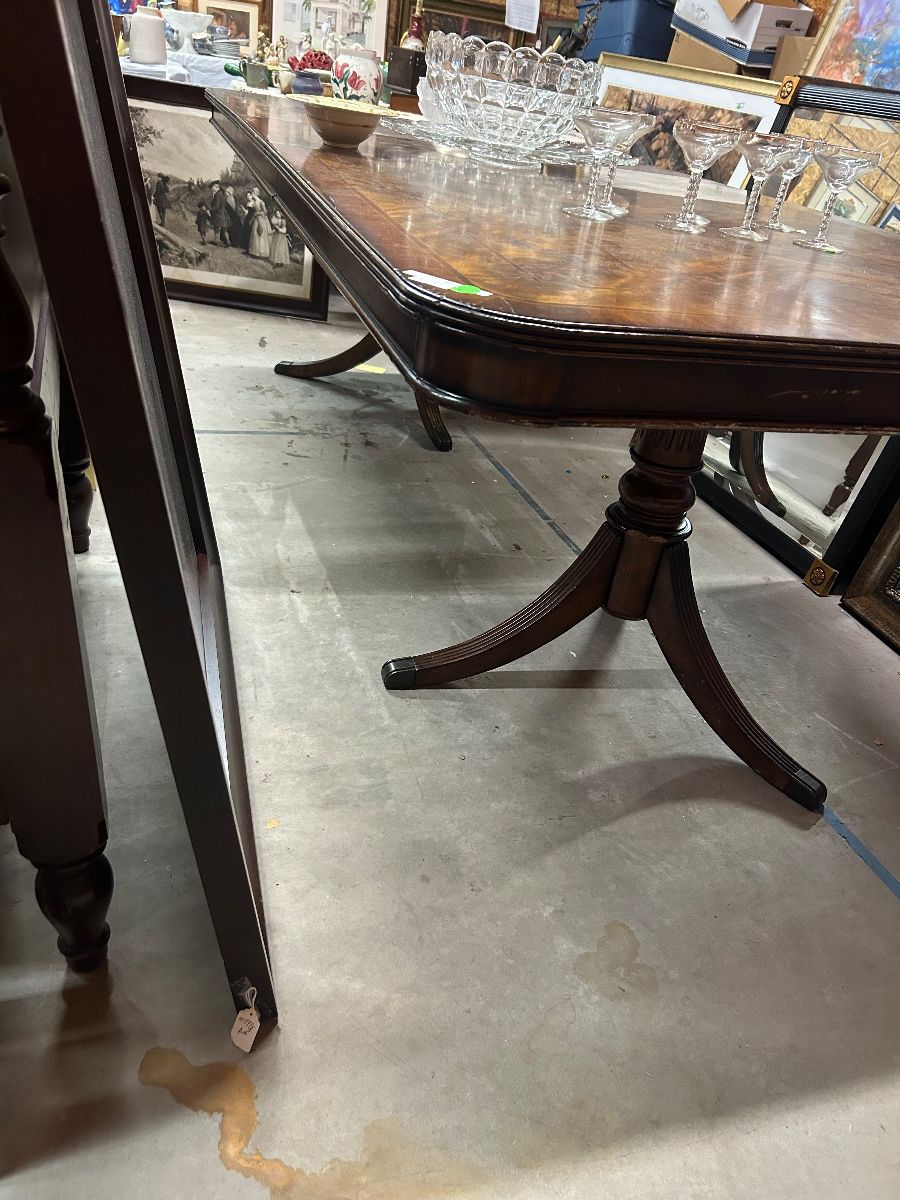 Two-pedestal dining table with well-figured satinwood inlay top $350
