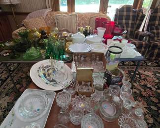 Milk glass, red glass styles, green glasses,  candles
