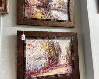 Framed landscape paintings