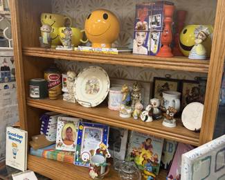 bookshelf with collectibles