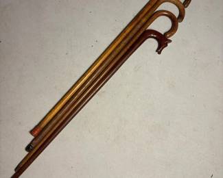 369 fourvintagewoodencanesonewithcarve