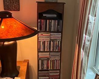 Vintage Wooden CD Tower with Decorative Figurine