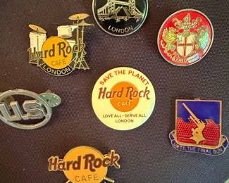 Collection of Enamel Pins: Hard Rock Cafe, Tower Bridge, London, London Crest, US Logo, and Military Unit