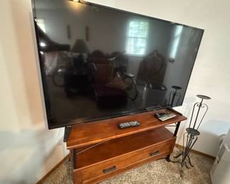 Very big TV and stand