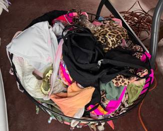 What you see here is a massive tub of bikini pieces, most never worn, from those 20-year-old girls with shopping problems. 