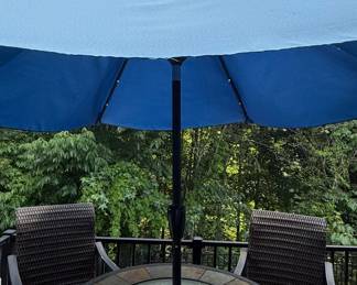Wicker and Slate Patio Dining Set with Umbrella