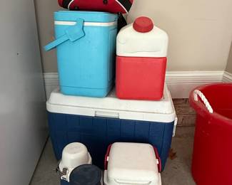 Assorted Vintage and Modern Plastic Coolers and Beverage Jugs, including Igloo and Coleman