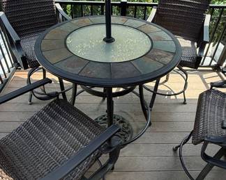 Wicker and Slate Patio Dining Set with Umbrella