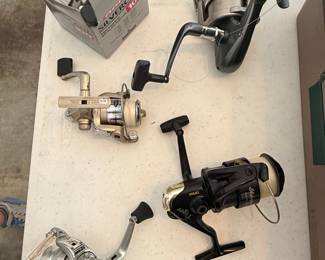 Assorted Vintage and Modern Fishing Reels (Lot of 4)