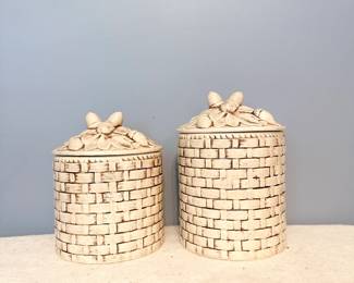 Vintage style ceramic jar with basket weave texture and acorn shaped finial 