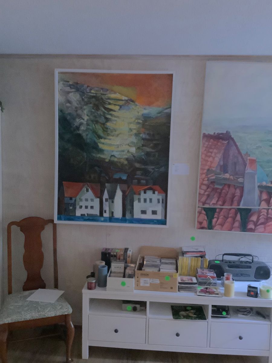 Just two of the beautiful oil paintings on canvas, Conrad Ross on the left and Janice K. Ross on right.