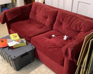 Red couch to sit and get comfortable while watching someone paint.  Well that is what I would use it for.  You might have another idea.