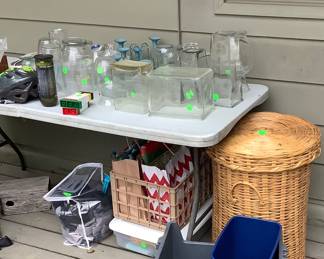 Table full of different vases in different sizes.  Easy to decoupage, use to take  flowers to shut ins.