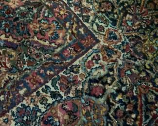 Close-up of Karastan rug in dining room. 