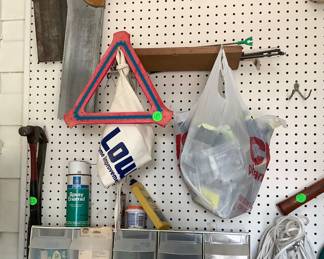 Just a few hand tools, supplies, nails, screws in laundry room.