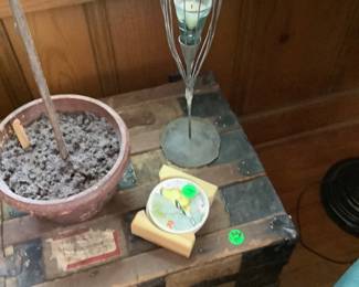 A old wood trunk.  There was an Army canvas tote in it.  Was probably used while in the military.