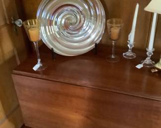 Beautiful brownish platter on stand on a gorgeous drop leaf table.