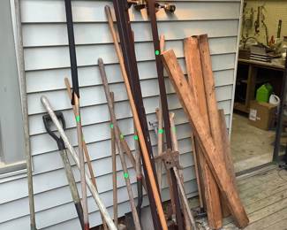 Yard tools.  Also have a large tin wash tub.