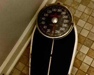 A pair of heavy metal weights scales.