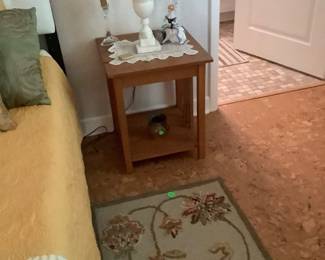 Beautiful crewel like rug in gold, green and dark rose.