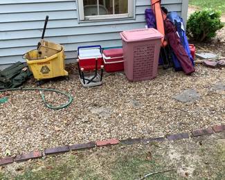 Folding chairs in their covers.