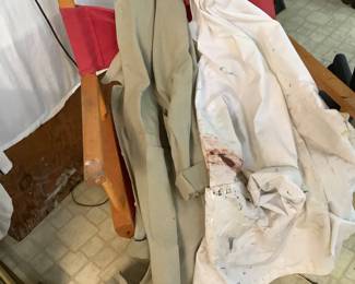 The folding chair with the owners paint jackets.