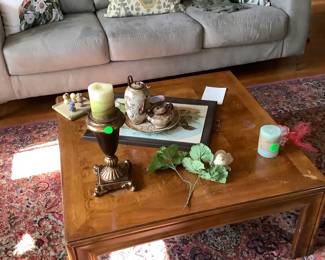 Gray modern couch with washable material.  In excellent condition, large solid wood coffee table.  Great table to play cards on.  Believe you me, they have plenty of them.