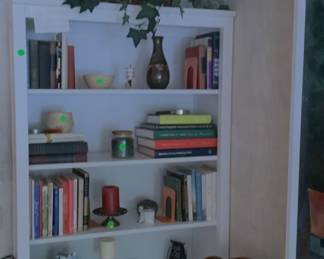 Items on white cabinet.