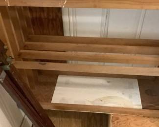 Cabinet to hold canvas.