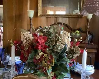 A view of the dining room in all her glory.  Sitting in the background is a walnut antique buffet with carved top.  Sitting on top are two globe lamps .
