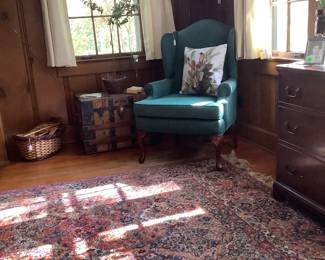 This is one of two green wing back chairs.  Has one of 4 pillows with different type birds in gorgeous colors.