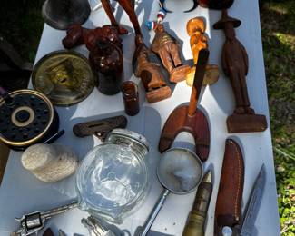 Leather Cadillac keychain, mini toy gun, knife, fishing reel, amber medicine bottles