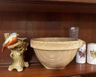 Yellow ware mixing bowl with pour spout, Czech bird vase