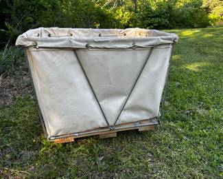 Industrial laundry cart on wheels