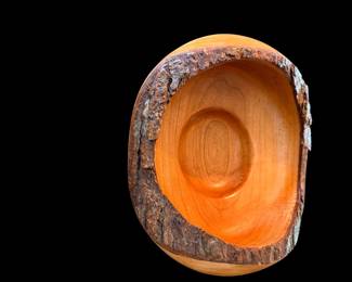 Hand turned wooden bowl with natural edge