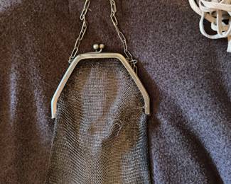 $55, Silver-Toned Metal Ring Mesh Purse with Chamfered Frame