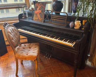 Ebonized Upright Piano with Carved Details and Tufted Chair
