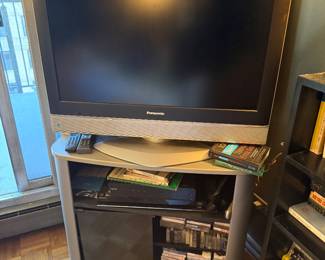 $50, Panasonic Flat Screen TV with Stand Media Console DVD Storage Entertainment Center