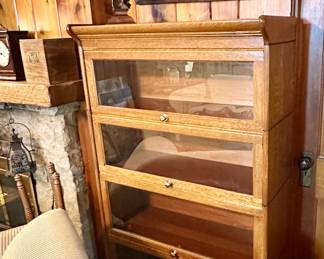 Beautiful tiger oak four bay barrister cabinet.