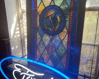 Gorgeous stained glass and Vintage Ford neon sign.